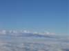 maunakeaphototakenfromtheairplanezoominginonthetopofthemountainshowsthetelescopes_small.jpg