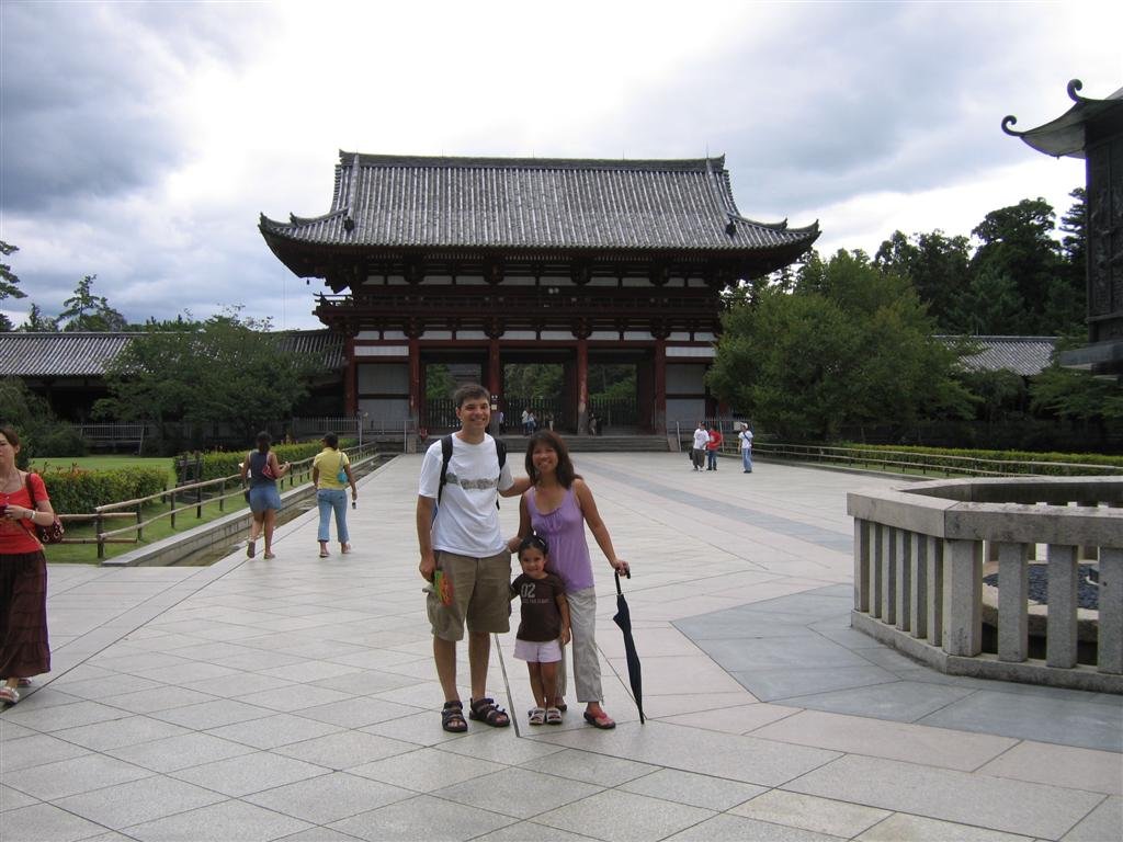 thefamilyposesinfrontofthegate.jpg